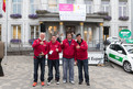 Zum Fackellauf trafen sich die Läufer vor dem Rathaus in Eupen. Auch Harald Spaniol, Steffen Schmitz, Andre Schleiernick und Emanuel Inspruckner sind dabei. (Foto: Luca Siermann)