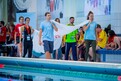 Feierliche Eröffnung des Schwimmfests in Würzburg: Die SOD Fahne wird von Kampfrichtern, s.Oliver Mitarbeitern und SO Athleten um das Becken herumgeführt. Foto: SOD/Sascha Klahn